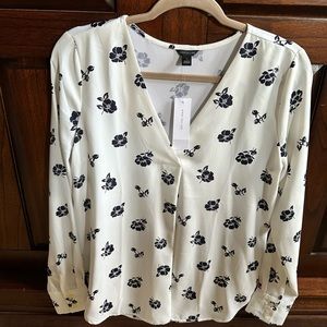 White and navy work blouse